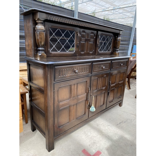 2952 - A PRIORY COURT CUPBOARD WITH PARTIALLY GLAZED AND LEADED UPPER PORTION, 60