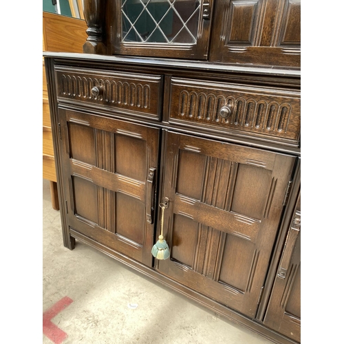 2952 - A PRIORY COURT CUPBOARD WITH PARTIALLY GLAZED AND LEADED UPPER PORTION, 60