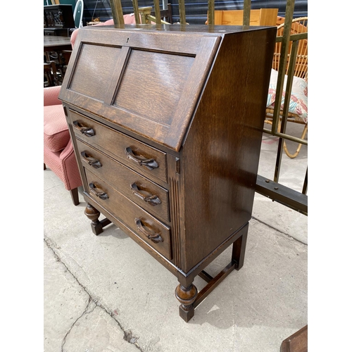 2958 - AN EARLY 20TH CENTURY OAK BUREAU ON OPEN BASE, 28.5