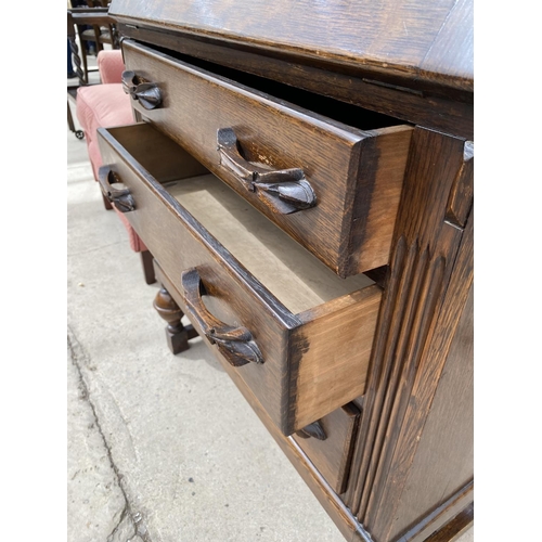 2958 - AN EARLY 20TH CENTURY OAK BUREAU ON OPEN BASE, 28.5