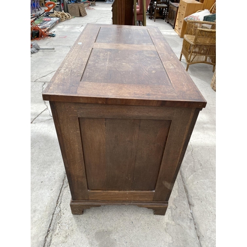 2962 - A GEORGIAN OAK AND CROSSBANDED BLANKET CHEST WITH TWO DRAWERS TO THE BASE, ON BRACKET FEET, 49