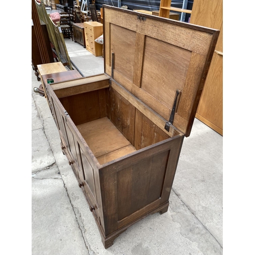 2962 - A GEORGIAN OAK AND CROSSBANDED BLANKET CHEST WITH TWO DRAWERS TO THE BASE, ON BRACKET FEET, 49