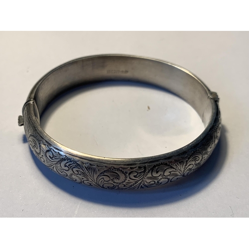 523 - TWO SILVER BANGLES