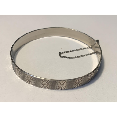 523 - TWO SILVER BANGLES