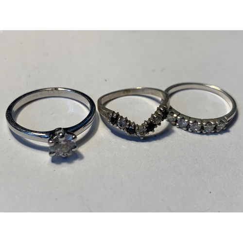 524 - FIVE VARIOUS SILVER RINGS