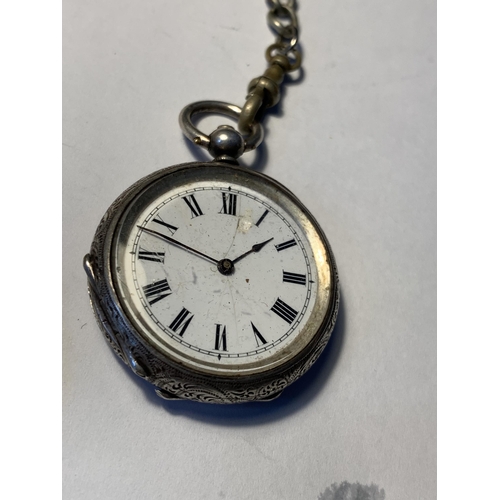 526 - A POCKET WATCH ON A CHAIN WITH A HALLMARKED BIRMINGHAM SILVER FOB