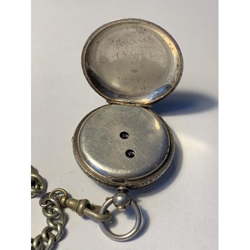 526 - A POCKET WATCH ON A CHAIN WITH A HALLMARKED BIRMINGHAM SILVER FOB