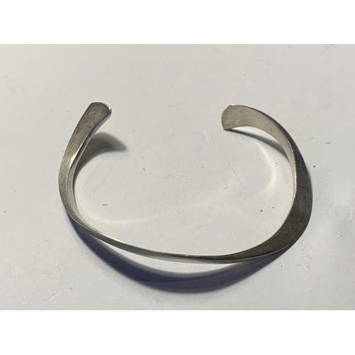 539 - THREE SILVER BANGLES