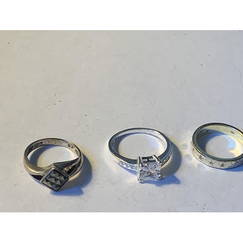 600 - FIVE VARIOUS SILVER RINGS