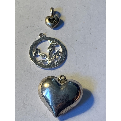 602 - SIX SILVER PENDANTS