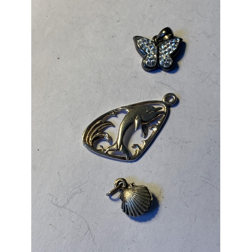 602 - SIX SILVER PENDANTS