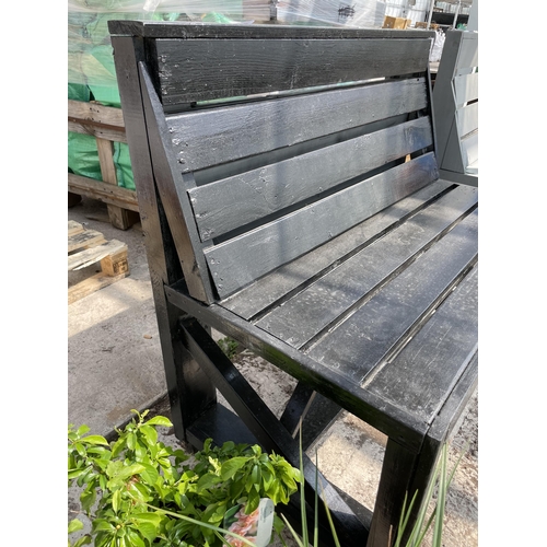 169 - A BLACK PAINTED TWO SEATER BENCH NO VAT