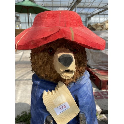 174 - A PADDINGTON BEAR WOOD CARVING APPROXIMATELY 85 CM TALL NO VAT