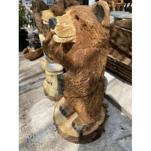 175 - A HONEY BEAR WOOD CARVING APPROX 80CM IN HEIGHT NO VAT