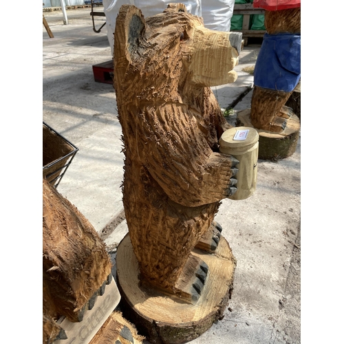 175 - A HONEY BEAR WOOD CARVING APPROX 80CM IN HEIGHT NO VAT