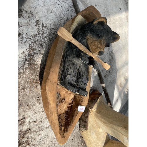 178 - A WOOD CARVING OF A BEAR IN A ROWING BOAT LENGHT APPROX 60CM NO VAT