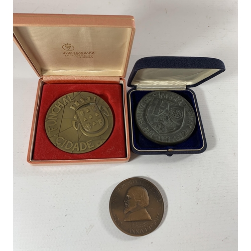 48 - * A LARGE CASED PORTUGUESE BRONZE MEDAL AND A LARGE GERMAN BRONZE MEDAL AND A SHAKESPEARE MEDAL (3)