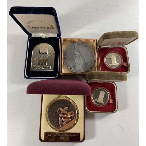 52 - * A COLLECTION OF CASED MEDALS RELATING TO SPORT, BANKING AND RUSSIA