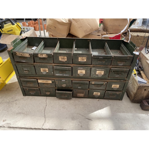 1677 - A VINTAGE INDUSTRIAL GREEN METAL EIGHTEEN DRAWER CABINET (LACKING TOP)