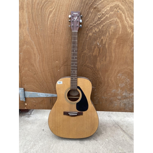 1561 - A YAMAHA F-310 ACOUSTIC GUITAR