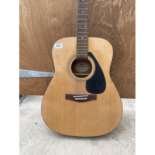 1561 - A YAMAHA F-310 ACOUSTIC GUITAR