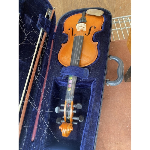 1580 - A VIOLIN IN CARRY CASE AND COMPLETE WITH A BOW