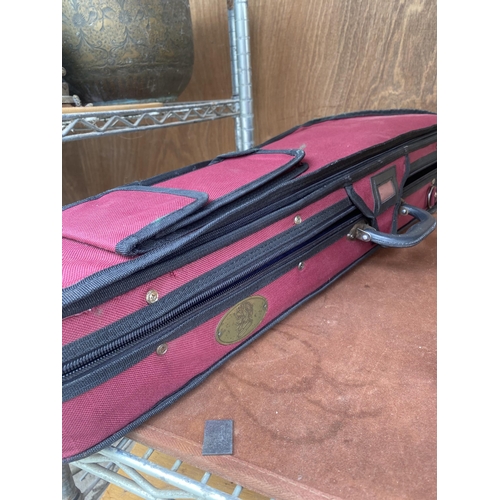 1580 - A VIOLIN IN CARRY CASE AND COMPLETE WITH A BOW