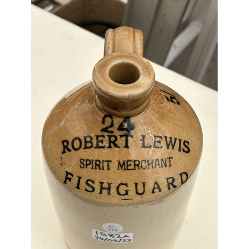 1582A - A VINTAGE ROBERT LEWIS FISHGUARD SPIRIT MERCHANT STONEWARE BOTTLE / FLAGON