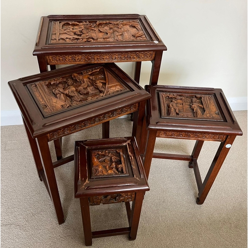 327 - A SET OF FOUR CHINESE CARVED HARDWOOD NEST OF TABLES, THE SMALLEST WITH SINGLE DRAWER