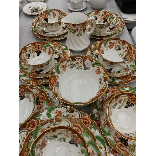 223 - A LARGE QUANTITY OF ROYAL WINDSOR CHINA CUPS, SAUCERS AND SIDE PLATES PLUS A CREAM JUG AND SUGAR BOW... 