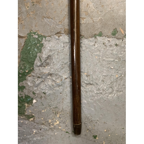 233 - A VINTAGE WALKING STICK WITH SEAL HEAD TOP