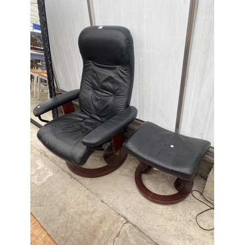 A STRESSLESS EKORNES SWIVEL RECLINER CHAIR WITH MATCHING STOOL