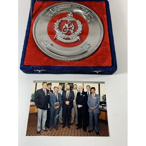 59 - * A LARGE CASED PUNJAB POLICE PLAQUE WITH PRESENTATION CARD TO SIR JAMES ANDERTON AND TWO PHOTOS