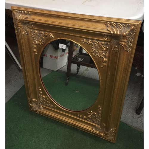 29 - A DECORATIVE GILT FRAMED MIRROR