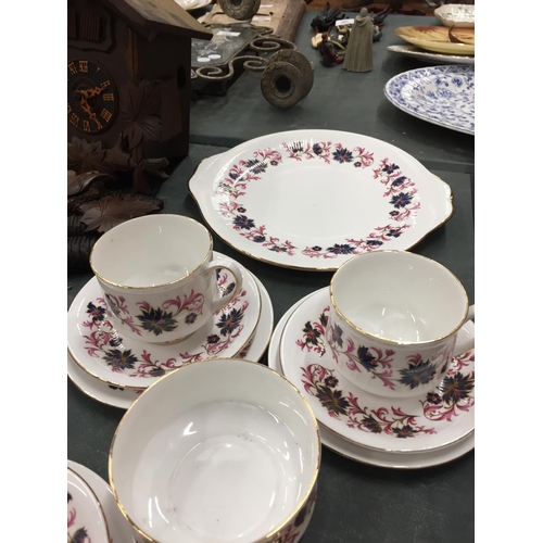 105 - A PARAGON 'MICHELLE' CHINA TEASET TO INCLUDE A CAKE PLATE, SUGAR BOWL, CREAM JUG, CUPS, SAUCERS AND ... 