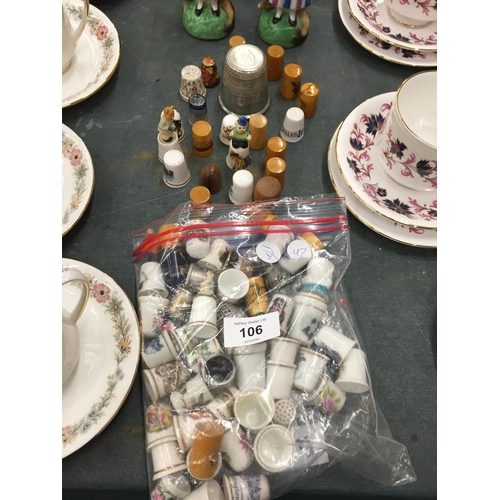 106 - A LARGE QUANTITY OF VINTAGE THIMBLES TO INCLUDE WOODEN AND CHINA, ETC