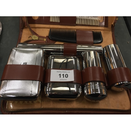 110 - A LEATHER CASED GENTLEMAN'S GROOMING KIT