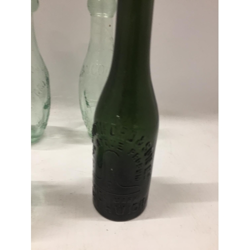 115 - FOUR VINTAGE GLASS BOTTLES