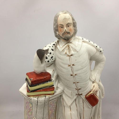 118 - A LARGE ANTIQUE STAFFORDSHIRE FIGURE OF SHAKESPEARE HEIGHT 47CM - A/F MISSING ONE ARM