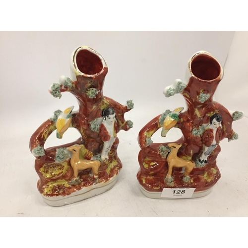 128 - A PAIR OF VINTAGE STAFFORDSHIRE STYLE SPILL HOLDERS WITH FIGURE AND FAUNA DECORATION HEIGHT 17.5CM