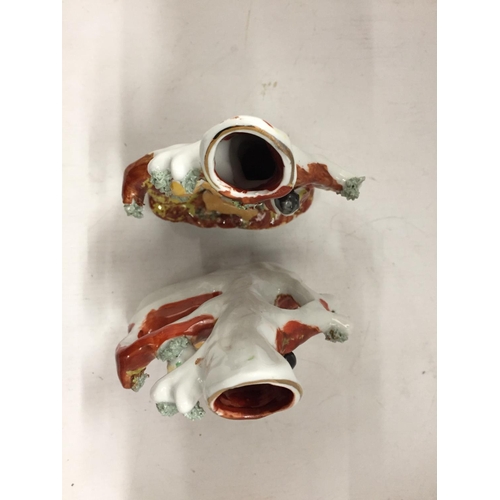 128 - A PAIR OF VINTAGE STAFFORDSHIRE STYLE SPILL HOLDERS WITH FIGURE AND FAUNA DECORATION HEIGHT 17.5CM