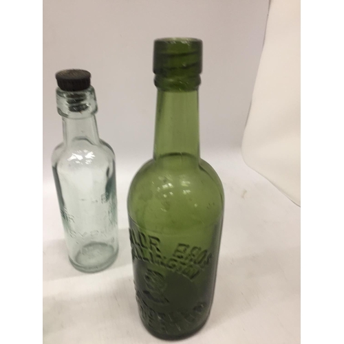 146 - THREE VINTAGE GLASS ADVERTISING BOTTLES