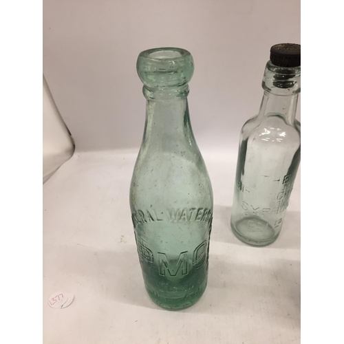 146 - THREE VINTAGE GLASS ADVERTISING BOTTLES