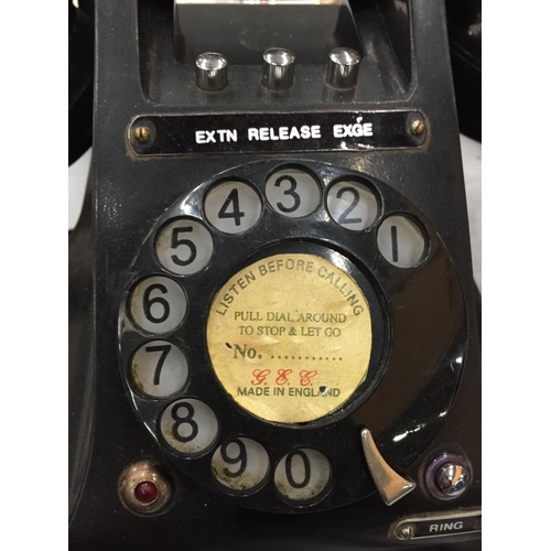 171 - A VINTAGE BLACK BAKELITE ROTARY DIAL TELEPHONE