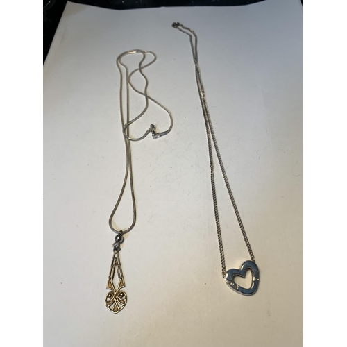 483 - TWO SILVER NECKLACES WITH PENDANTS