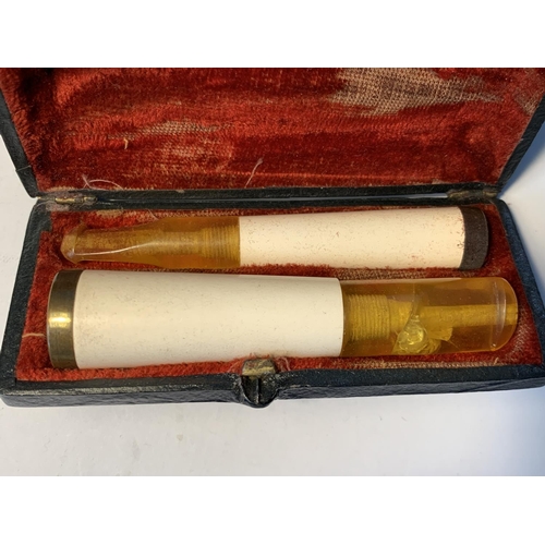 491 - AN AMBER AND MEERSHAM CIGAR AND CIGARETTE HOLDER IN ORIGINAL BOX