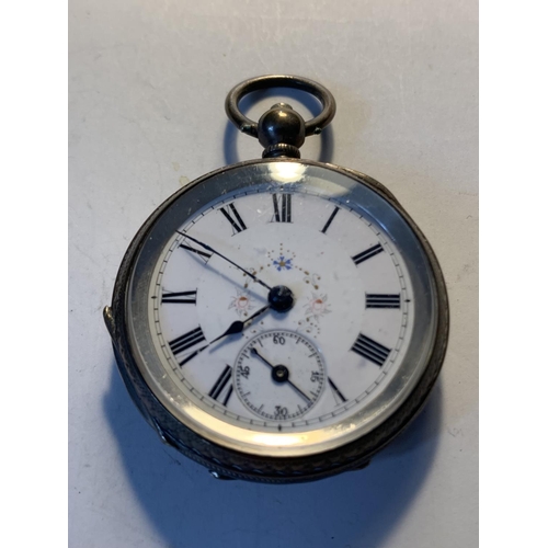 514 - AN 800 SILVER POCKET WATCH WITH SUB DIAL, DECORATIVE WHITE ENAMEL FACE, ROMAN NUMERALS AND A KEY