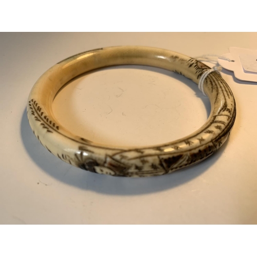 635 - A BONE ORIENTAL BANGLE