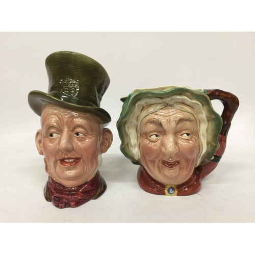 701 - TWO BESWICK CHARACTER JUGS - MICAWBER AND SAIREY GAMP - 23CM AND 16.5 CM