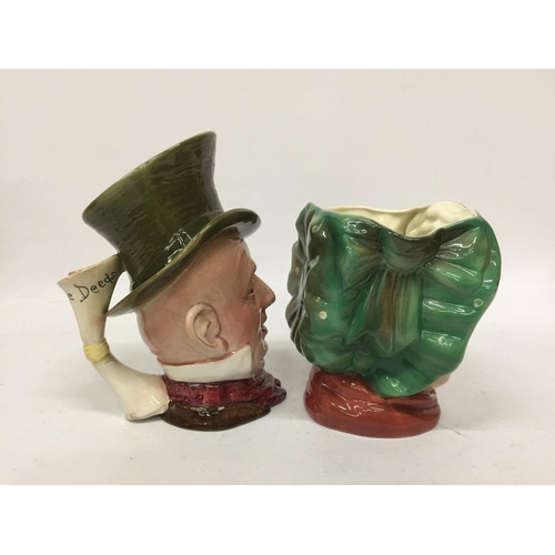 701 - TWO BESWICK CHARACTER JUGS - MICAWBER AND SAIREY GAMP - 23CM AND 16.5 CM